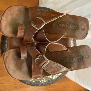 Na Na Leather Sandals with Buckle on wood. 8